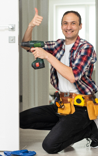 happy repair man fixing broken door lock