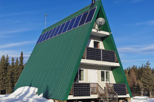 Seasonal cabin with residential off grid solar and wind system